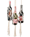 Solid Oak's "bottle bags" macrame DIY kit - showing three styles made with wine bottles to show how they are used
