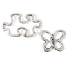 Solid Oak's silvertone cast metal charms - stylized butterfly and puzzle piece